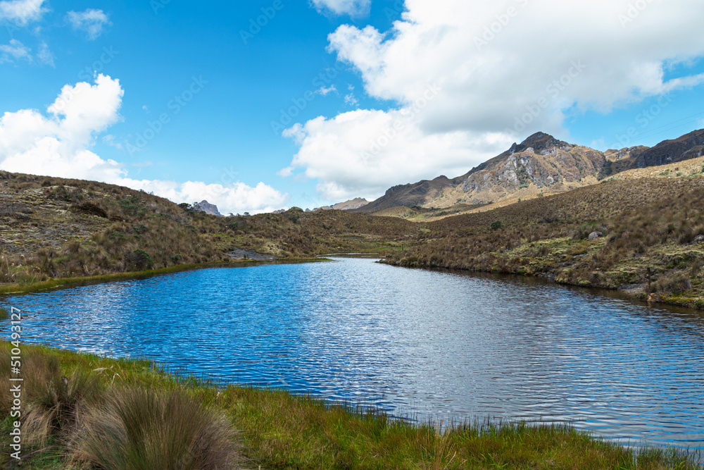 The mountain lake in Cajas National Park on sunny day, Toreadora recreation zone. South America, Ecuador, Azuay province close to Cuenca