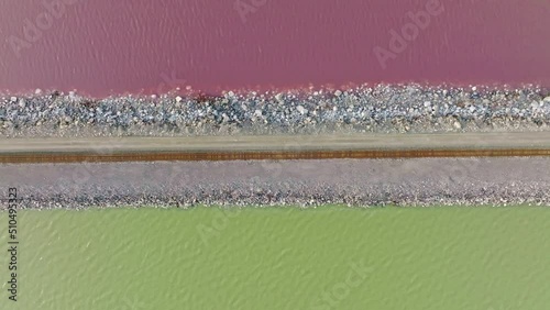 AERIAL - Railway, Lucin Cutoff, purple green Great Salt Lake, Utah, top down right to left photo