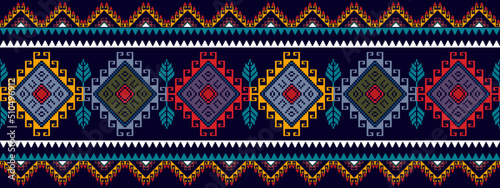 Ikat ethnic seamless pattern design. Aztec fabric carpet mandala ornaments textile decorations wallpaper. Tribal boho native ethnic turkey traditional embroidery vector background 