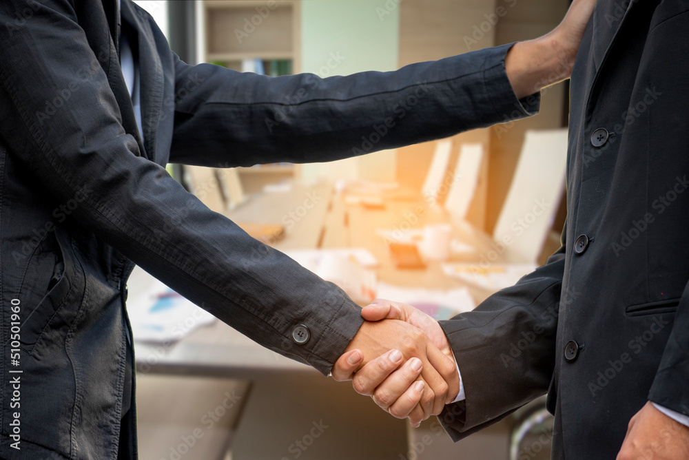 Fototapeta premium Trust Promise Concept. Honest Lawyer Partner with Professional Team make Law Business Agreement after Complete Deal. Ethics Business people handshake, touch and Respect customer to trust partnership.