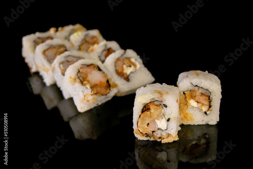 sushi on black background