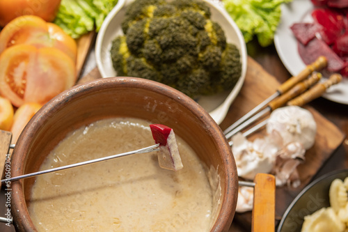 ingredients for bagna cauda sauce with cream and anchovies
