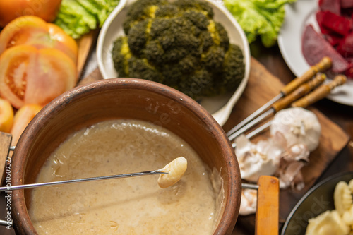 ingredients for bagna cauda sauce with cream and anchovies