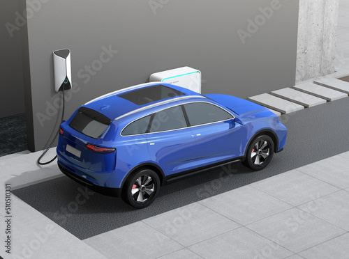 Rear view of blue electric SUV charing at home garage. 3D rendering image.