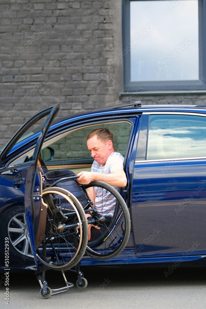 car driver with wheelchair, man with disability, driver with disability car driver with wheelchair, man with disability, driver with disability