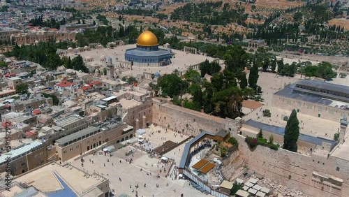 The kotel and golden dome of the rock mosque, aerial view
Drone and unique shot from Jerusalem in summer of 2022, the Kotel and al Aqsa mosque, israel

 photo