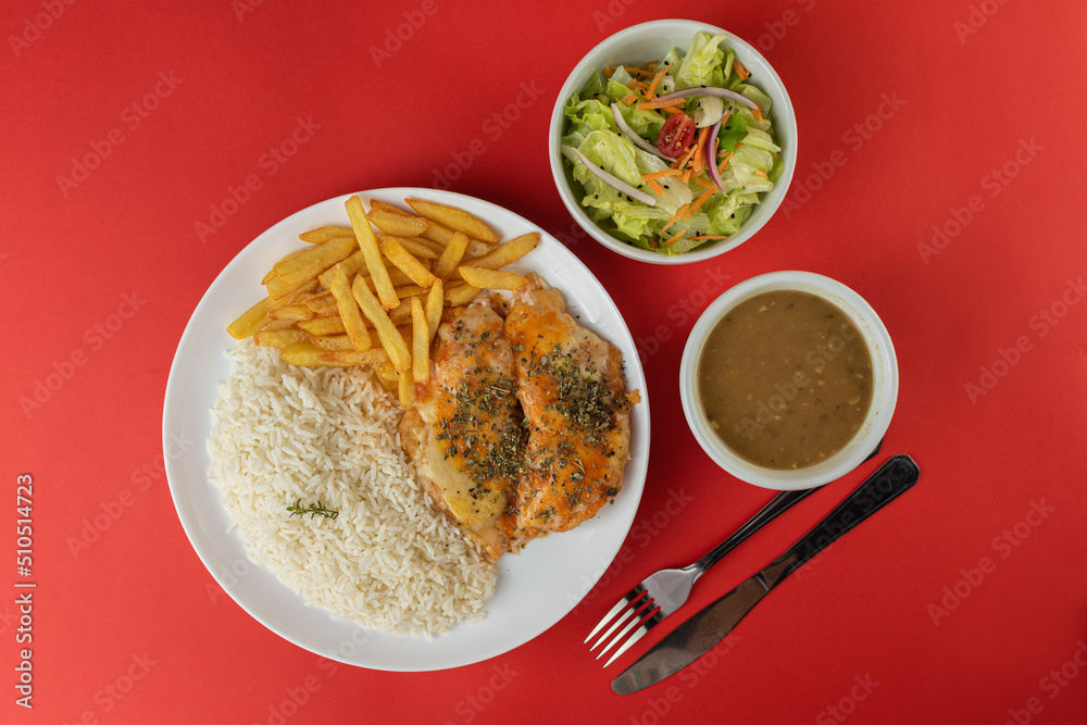 Meal - Chicken Parmigiana, rice, beans, salad and fries