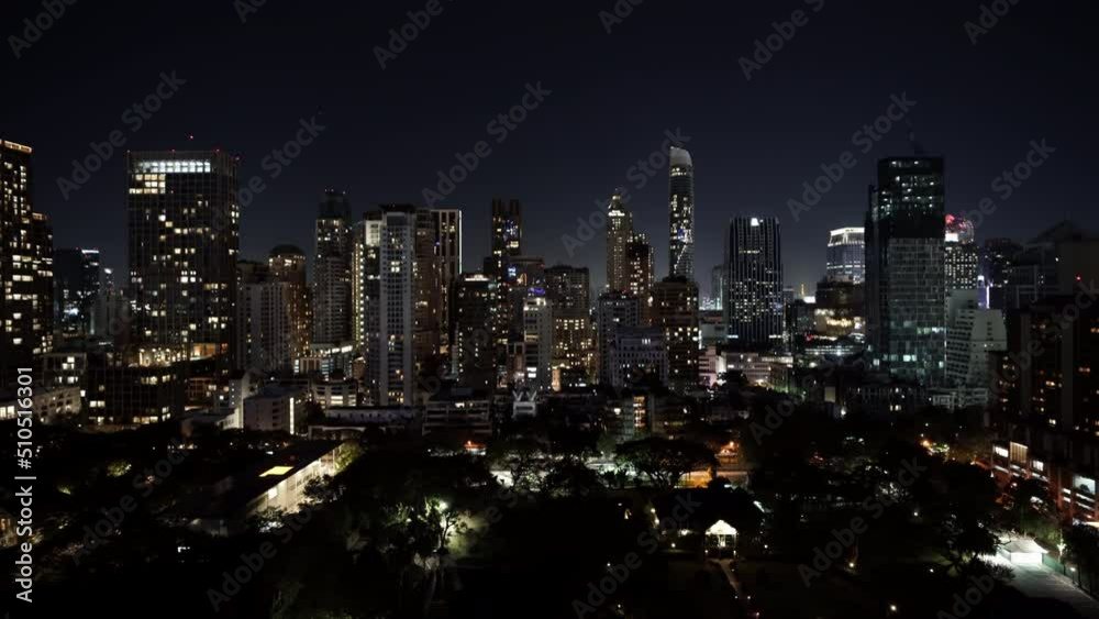 high-rise buildings cityscape near Witthayu road at night in Bangkok city, Thailand high-rise buildings cityscape near Witthayu road at night in Bangkok city, Thailand