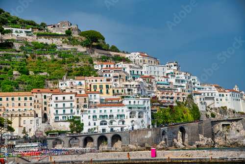 Positano, Italy - June 29, 2021: Town coastline and buildings on a sunny day