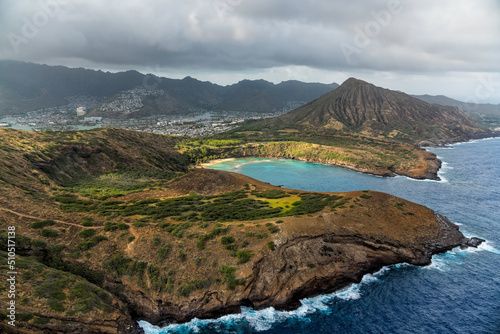 Aerial panorama of Hanauma Bay with water cliffs and Koko crater summit in the background, Oahu Island