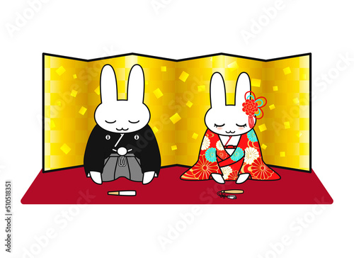 結婚式で和装のウサギの新郎新婦が並んでお辞儀をするイラスト　色打掛