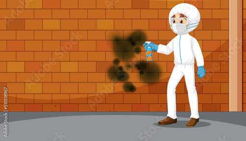 A man cleaning mould on the wall