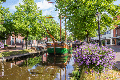 Wooden sailing ship in the shopping street of Papenburg, Germany