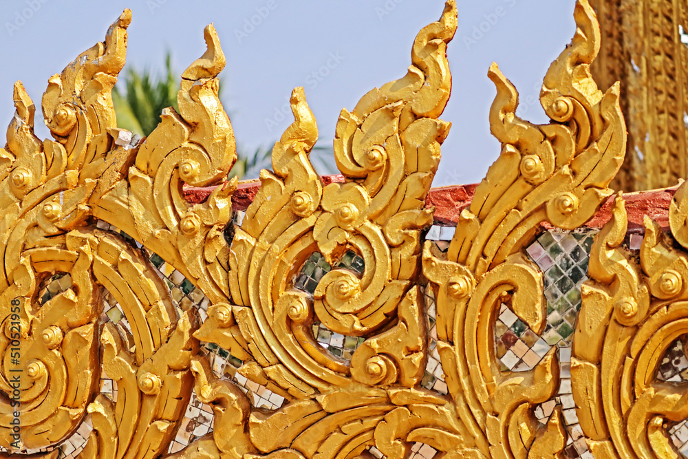 Traditional Thai style golden stucco in Thai temple Traditional Thai style golden stucco in Thai temple