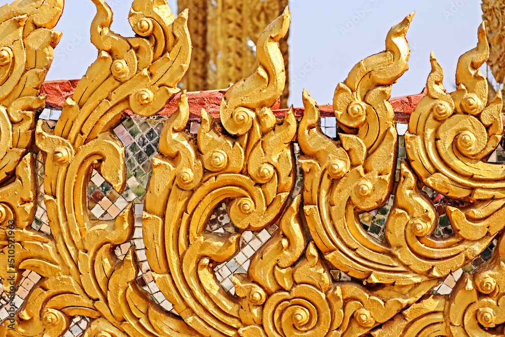 Traditional Thai style golden stucco in Thai temple