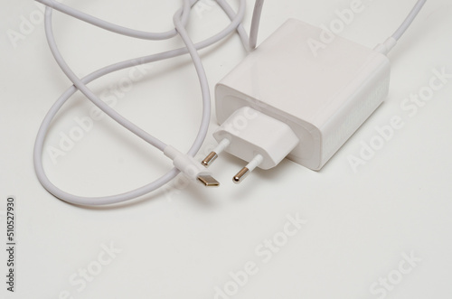 white laptop charger with type-c cable