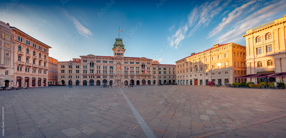 Panoramic summer cityscape Trieste, Italy, Europe. Stunning morning view of popular tourist attraction - Unity of Italy Square. Traveling concept background.