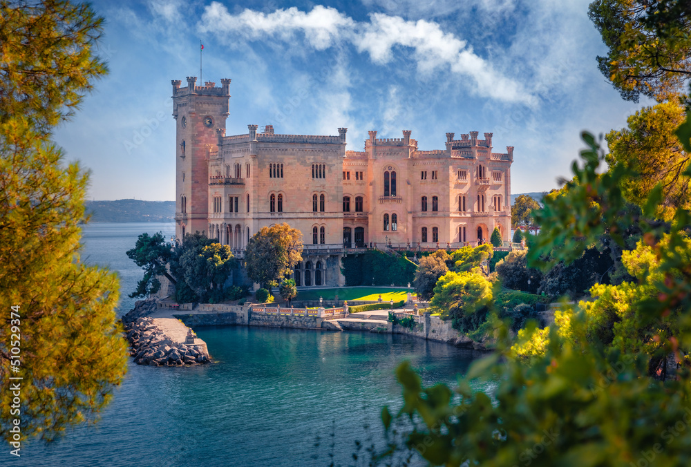 Fototapeta premium Spectacular summer view of Miramare Castle. Wonderful morning seascape of Adriatic sea. Exciting outdoor scene of Italy, Europe. Traveling concept background.