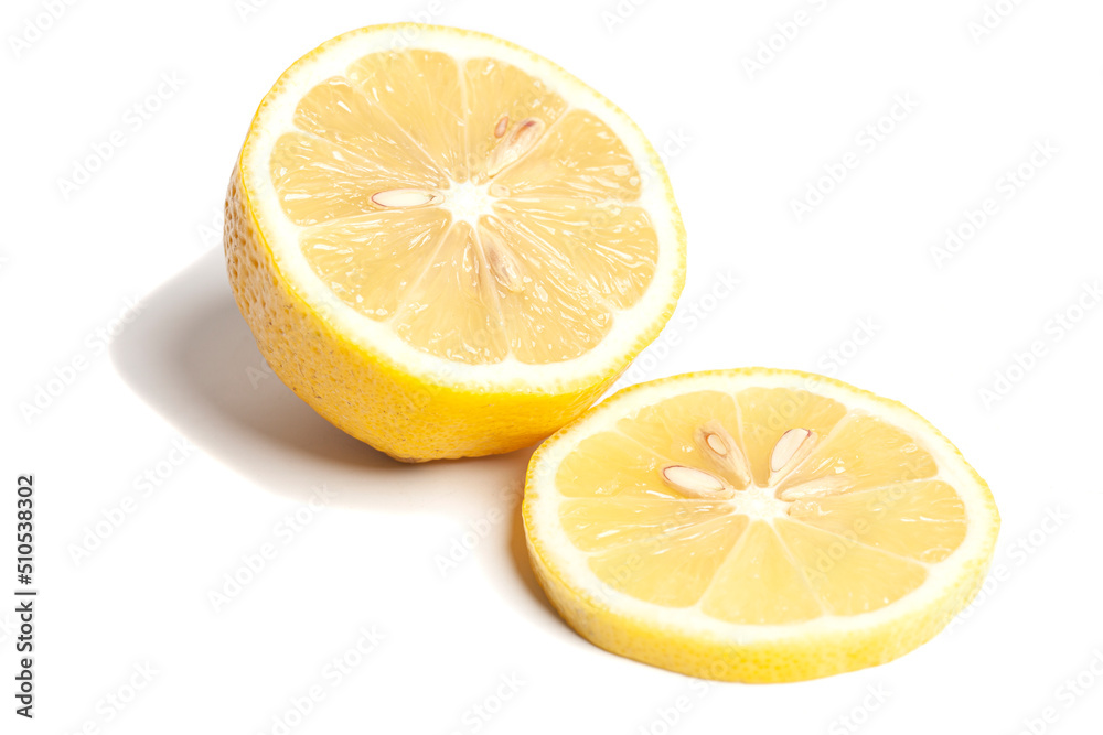 Single cut lemon citrus fruit with lemon slice isolated on white background