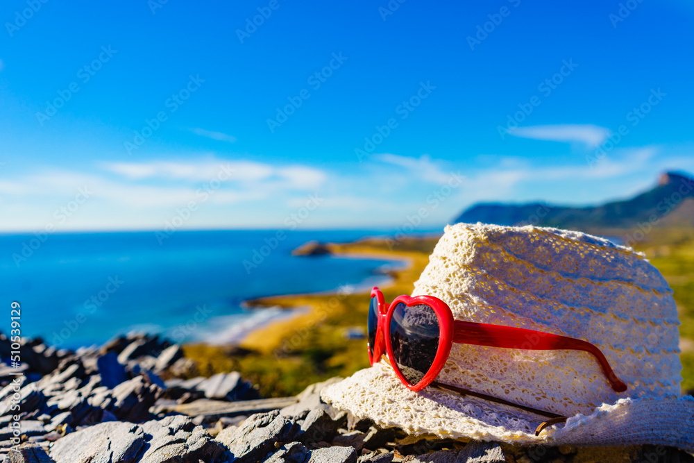 Summer hat on sunny sea coast, Murcia Spain - obrazy, fototapety, plakaty 