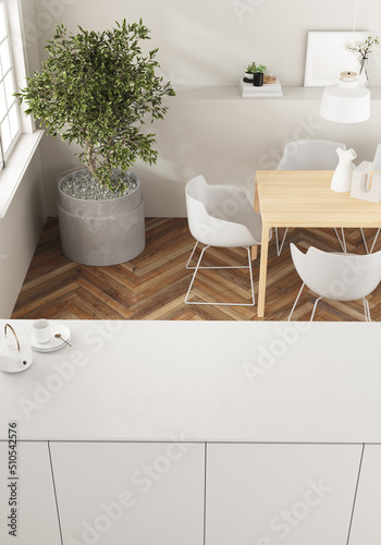 Part of the kitchen area loft. Dining area of ​​a loft space. Original parquet with herringbone pattern in wood color. White lacquered furniture