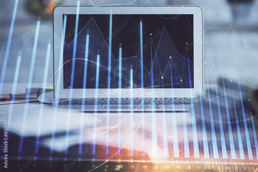 Stock market graph and table with computer background. Multi exposure. Concept of financial analysis. Stock market graph and table with computer background. Multi exposure. Concept of financial analysis.