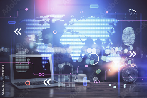 Multi exposure of table with computer and world map hologram. International data network concept.