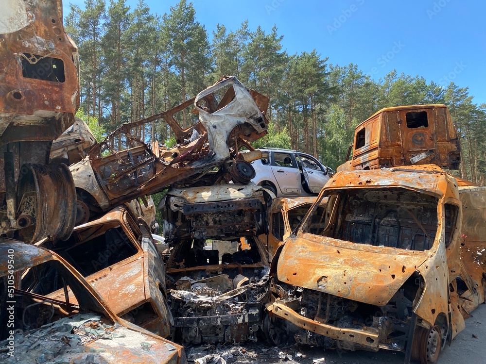 Car mortuary. Damaged cars in Irpen, near Bucha