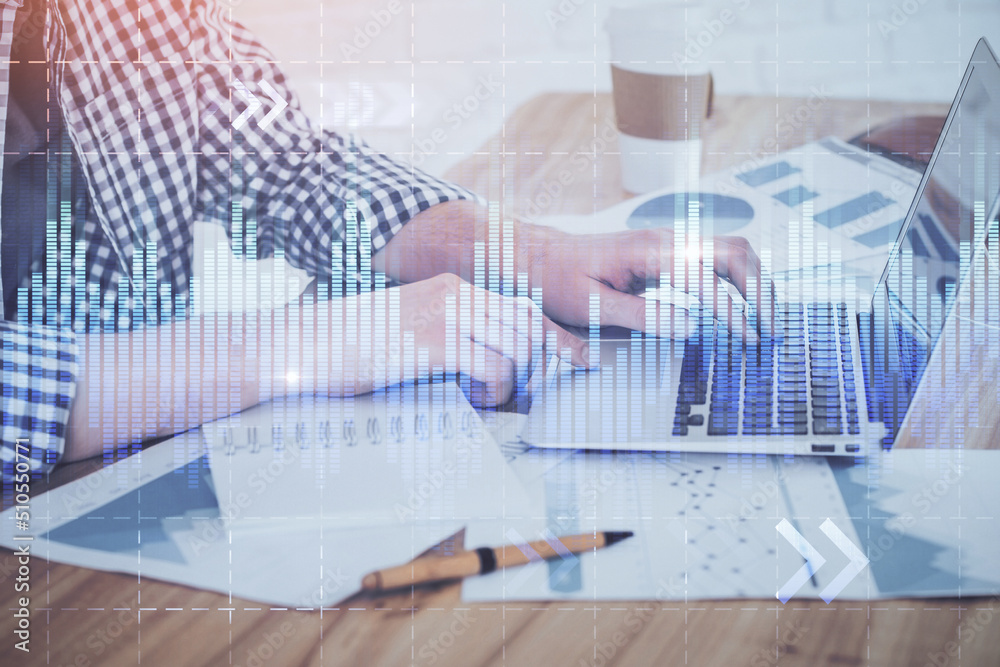 Multi exposure of stock market chart with man working on computer on background. Concept of financial analysis. Multi exposure of stock market chart with man working on computer on background. Concept of financial analysis.