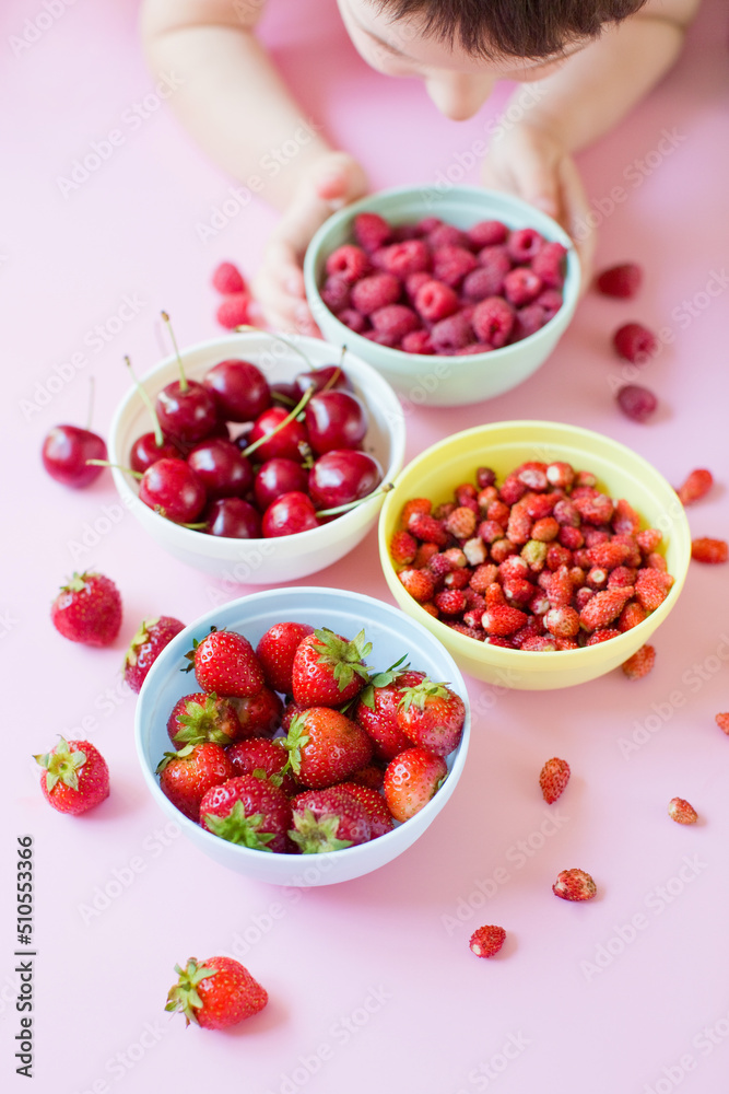 Strawberry,cherry,raspberry berries in bowls Strawberry,cherry,raspberry berries in bowls