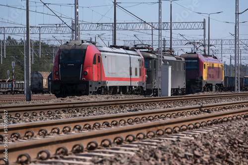 LOCOMOTIVES - Electric vehicles on a siding and railway infrastructure