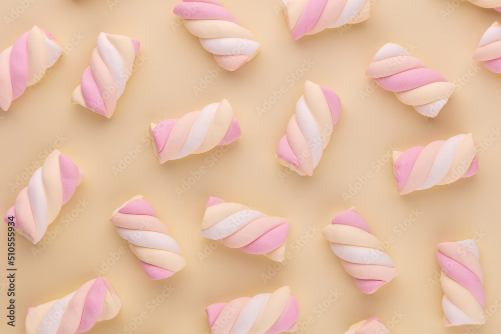 Colorful marshmallow laid out on pastel background. Creative textured pattern. Colorful marshmallow laid out on pastel background. Creative textured pattern.