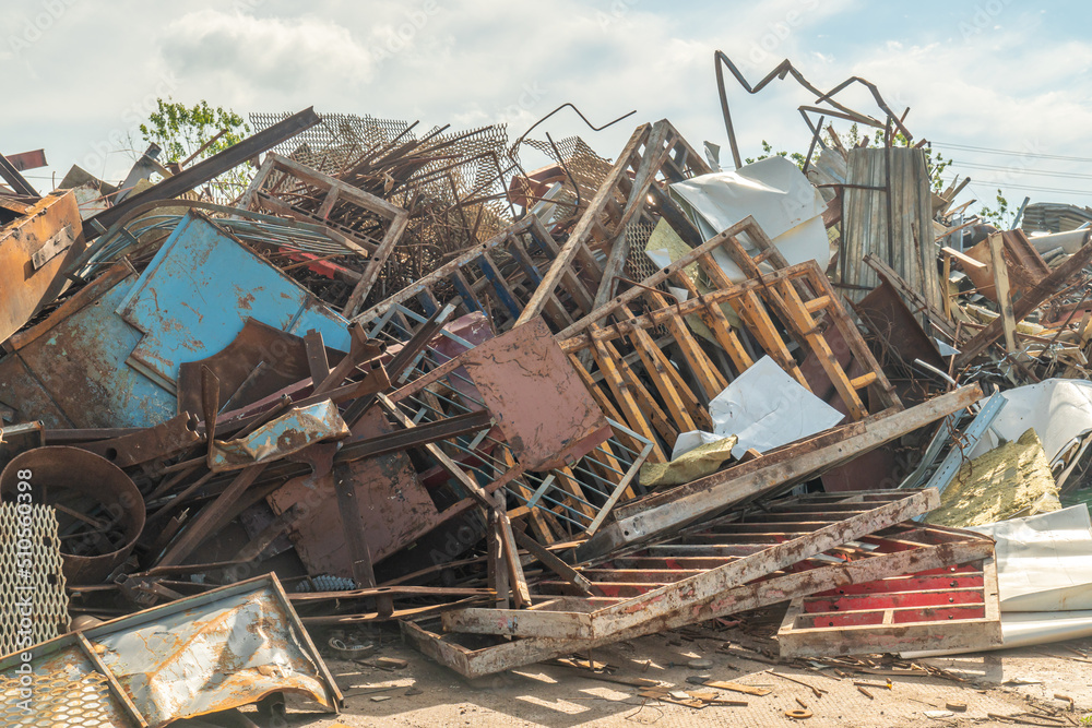 Processing industry, a pile of old scrap metal, ready for recycling. Scrap metal recycling.
