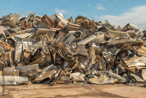 Processing industry, a pile of old scrap metal, ready for recycling. Scrap metal recycling. 