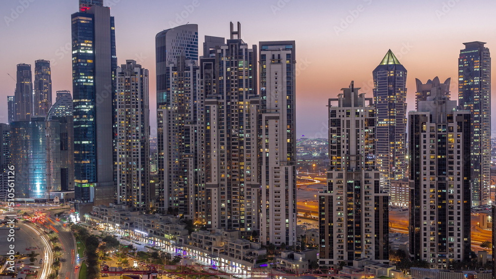 Bay Avenue with modern towers residential development in Business Bay aerial day to night timelapse, Dubai