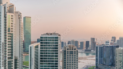 Business Bay Dubai skyscrapers with water canal aerial timelapse. © neiezhmakov