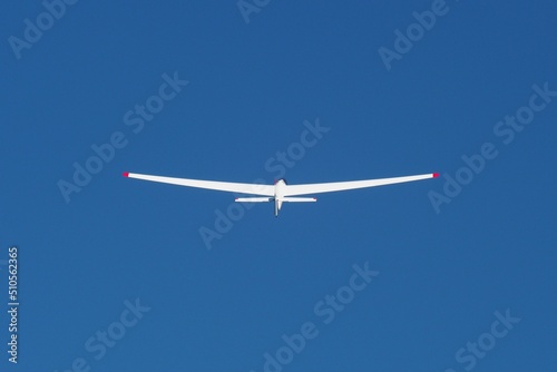 glider in the blue sky