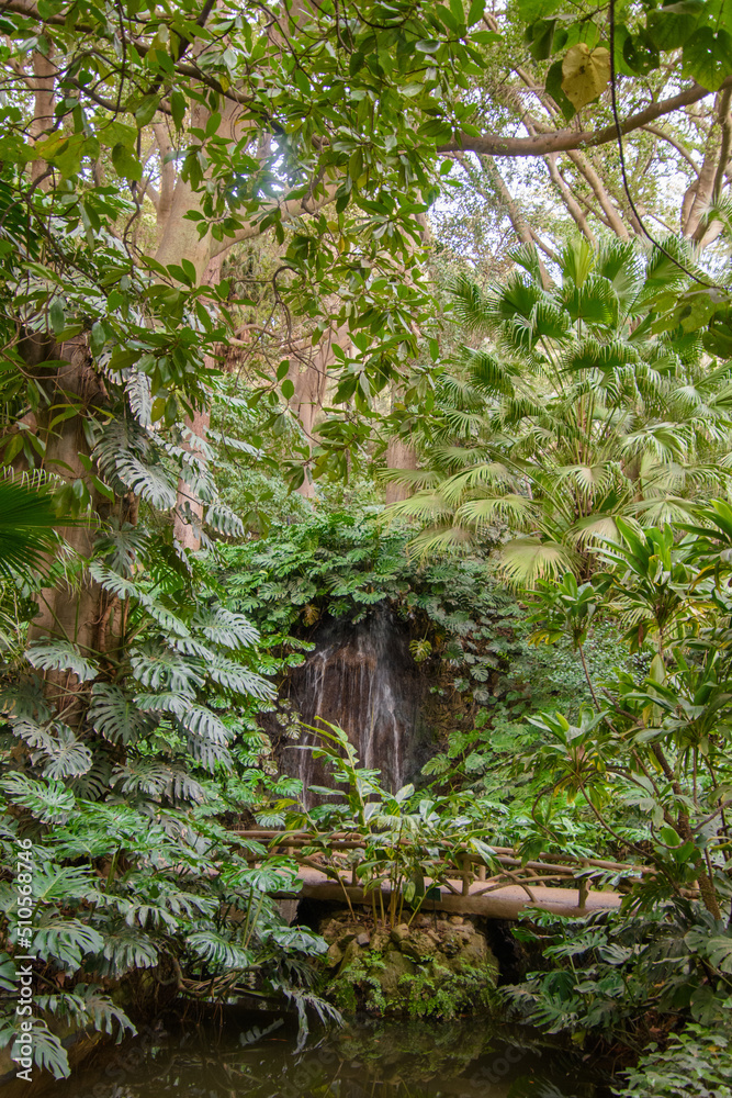 Stream in the beautiful historical botanical garden of the Conception of Malaga, Andalucia, Spain