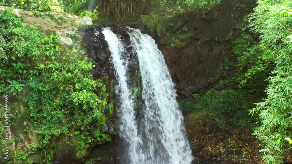 Flying backwards at the Gold (ouro) watrefalls in Roca Agostinho Neto, Sao Tome and Principe, Africa