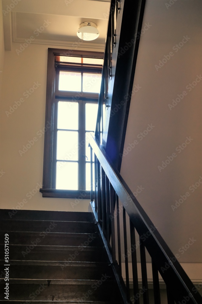 wooden staircase and window in classical house wooden staircase and window in classical house