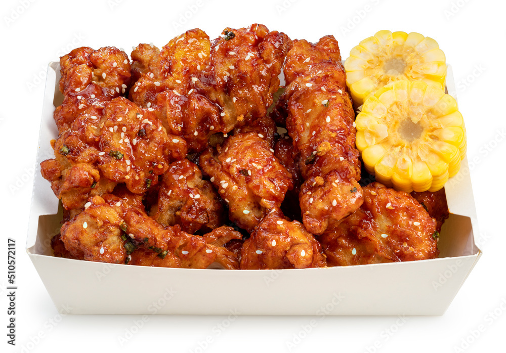 Korean Fried chicken in paper bucket isolated on white background, Korean spicy sauce fried chicken on white With clipping path. Korean Fried chicken in paper bucket isolated on white background, Korean spicy sauce fried chicken on white With clipping path.