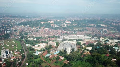 Wallpaper Mural Cityscape of Kempala, largest city and the capital of Uganda, during sunny day - birds eye view Torontodigital.ca