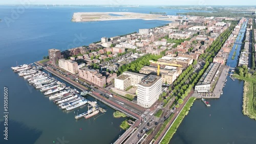 Amsterdam Ijburg artificial island modern residential area smart city cityscape at water Ijmeer. Urban houses buildings city environment area. photo