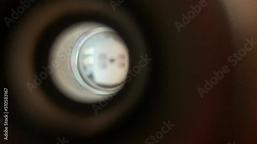 4k View from peephole of wooden office door photo