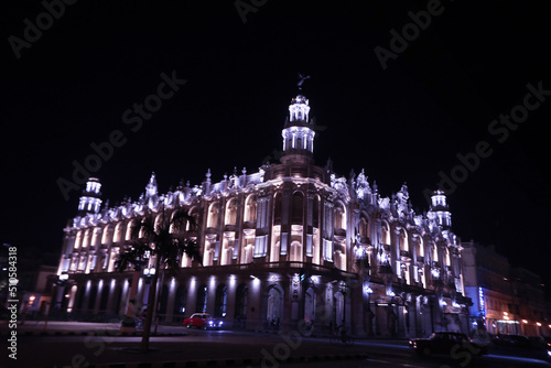 Night view of the Gran Teatro de La Habana (Great Theatre of Havana) and the famous hotel Inglaterra near the Central Park in Havana, Cuba photo