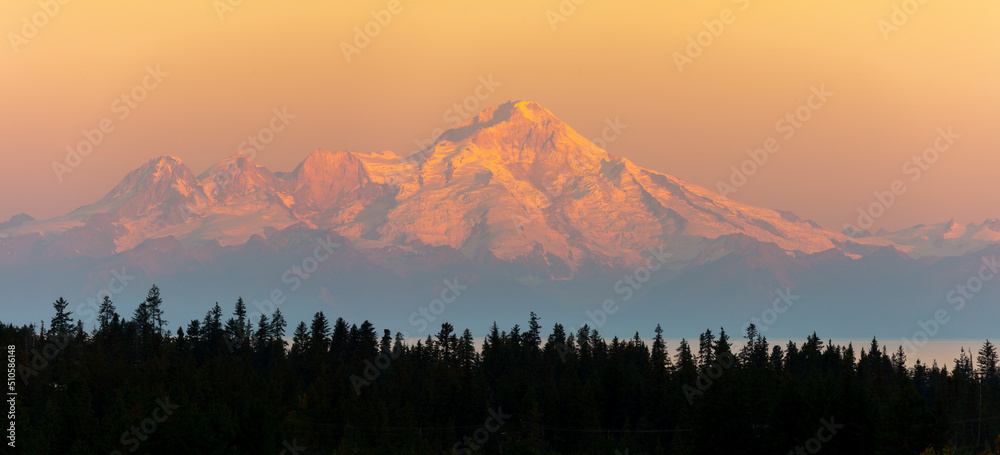 Panorama image of the glacier capped Mount Redoubt volcano from Anchor Point, Homer at sunrise - obrazy, fototapety, plakaty 