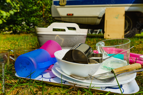 Washing dishes, capming outdoor photo