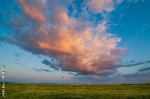 Panorama of a twilight sunset and colorful clouds - sunlight with dramatic cloud. © pavlobaliukh