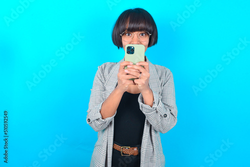 Print op canvas Portrait of serious confident Young businesswoman with bob haircut wearing blaze