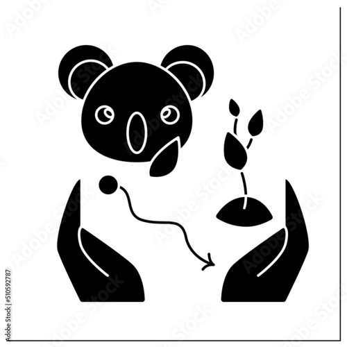 Wildlife protection glyph icon. Plant and Koala bear in palms. Biodiversity loss, ecosystem sustainability and animal population recreation.Filled flat sign. Isolated silhouette vector illustration